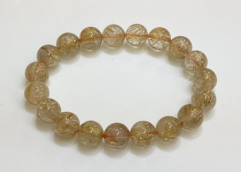高品質】ブラジル産ゴールドルチルAAAAA 約11㎜珠 手首サイス約18