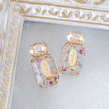 リボン付き香水ボトル 61UMFnbcODL._AC_UF350,