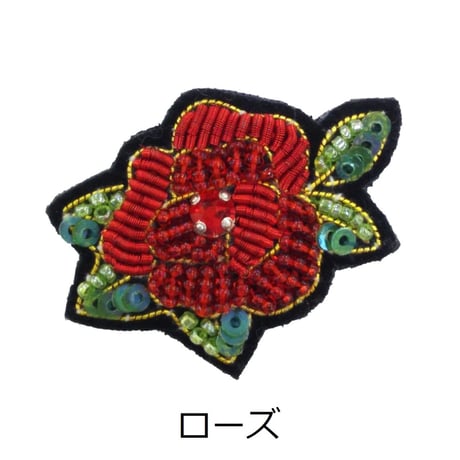 小花のブローチ