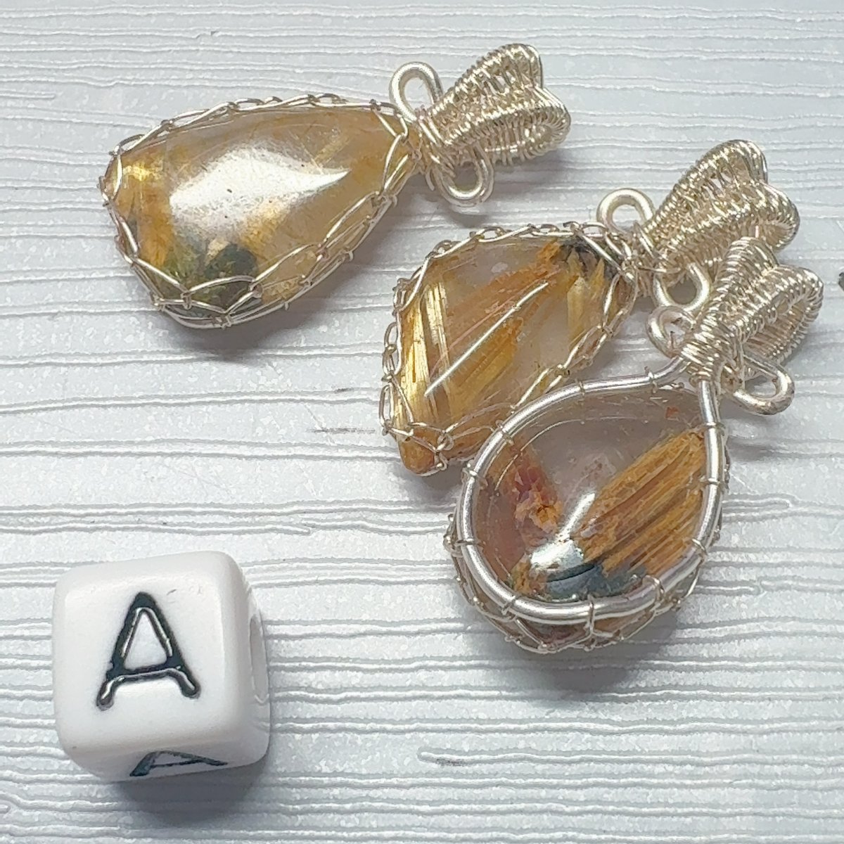 ルチルワイヤーペンダントトップ シルバーカラー 23~30mm | pundarika