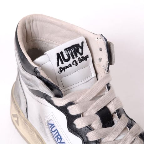 オートリー AUTRY レディース スーパーヴィンテージメダリストミッドカットスニーカー レザー ブラックホワイトシルバー