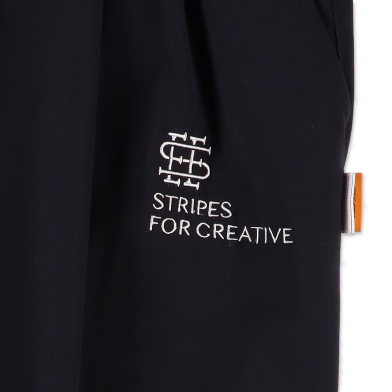 SEE SEE x S.F.C パンツ SEE SEE x S.F.C Stitched Wide Tapered Nylon Pants 