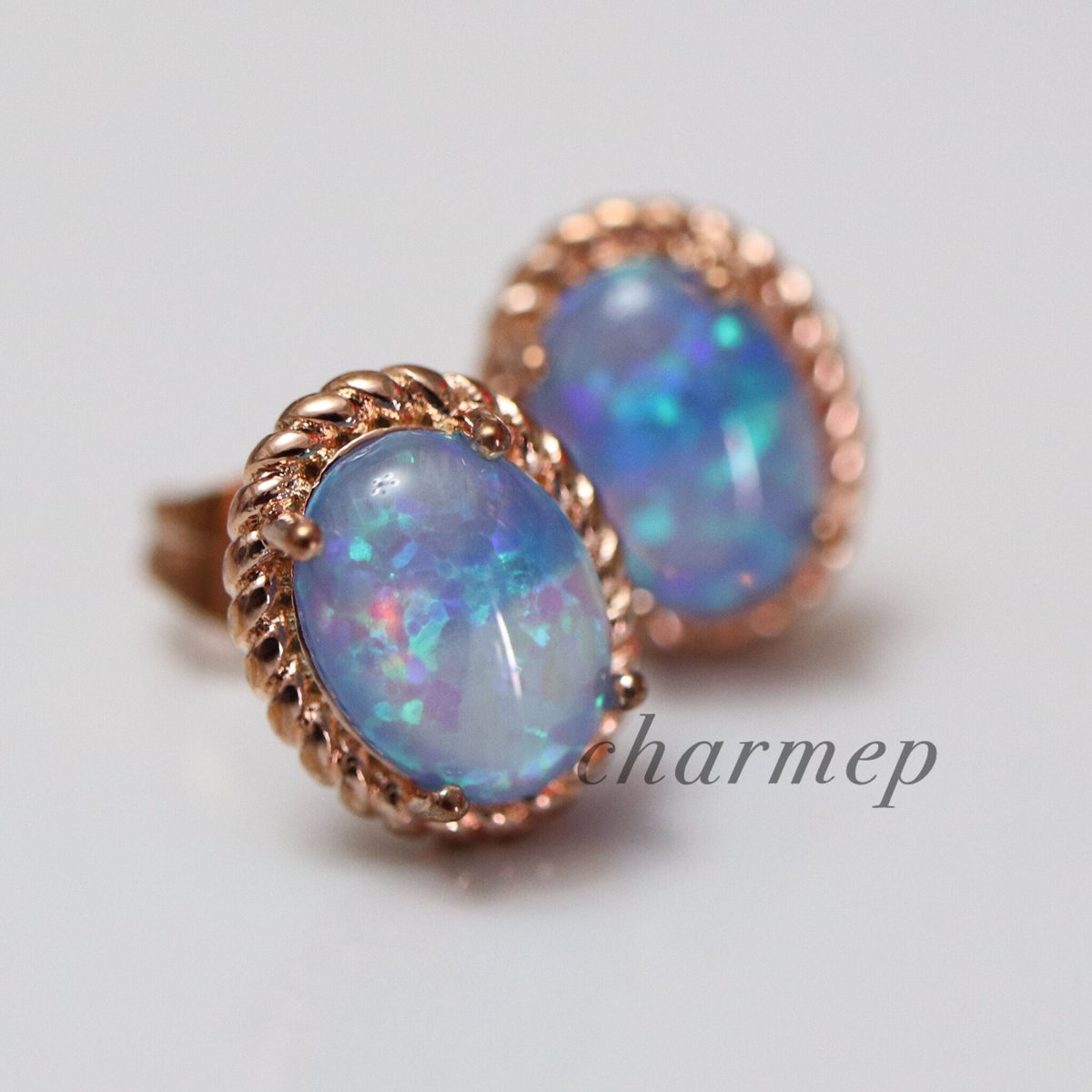 P220】人工ブルーオパールのオーバルミル打ちピンクゴールドピアス