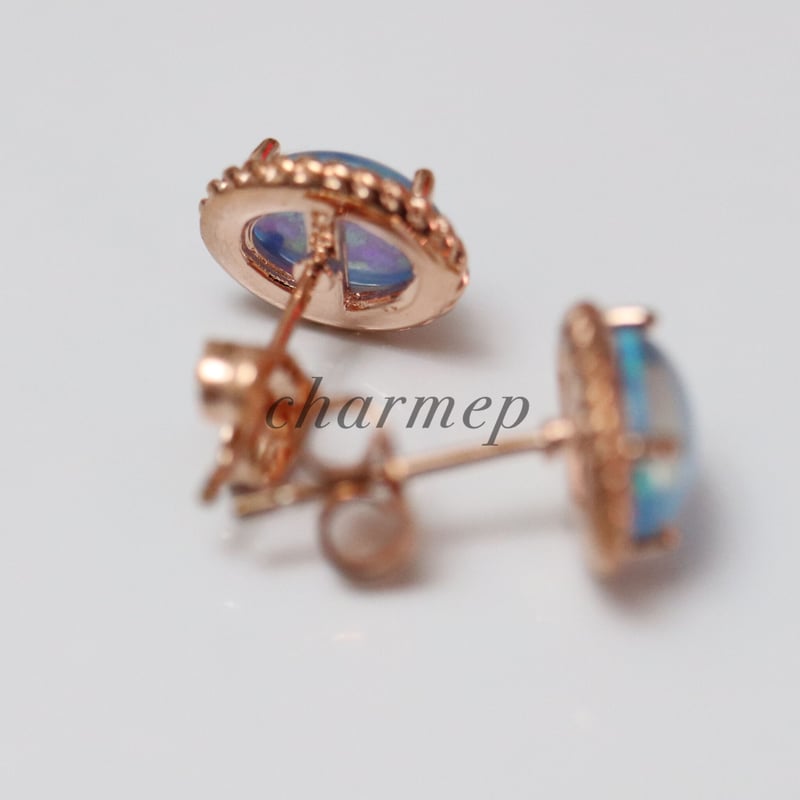 P220】人工ブルーオパールのオーバルミル打ちピンクゴールドピアス
