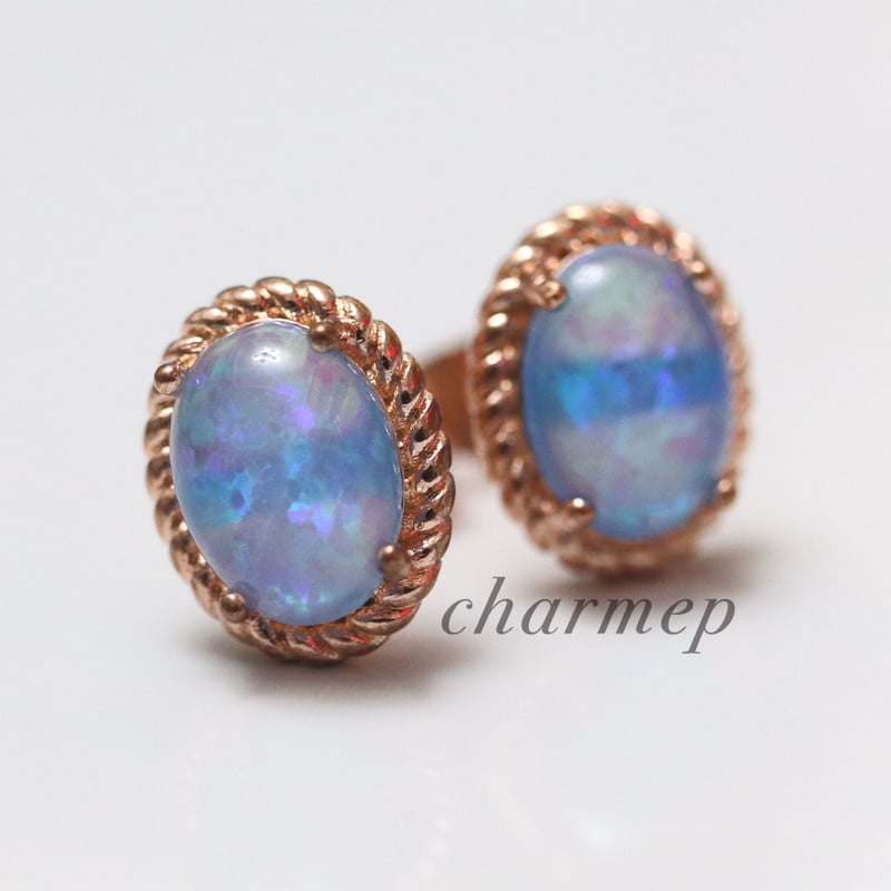 P220】人工ブルーオパールのオーバルミル打ちピンクゴールドピアス