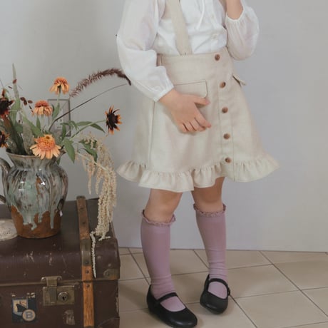 Frill suspender skirt / tweed milk
