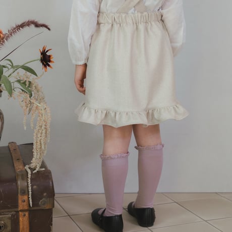 Frill suspender skirt / tweed milk