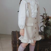Frill suspender skirt / tweed milk