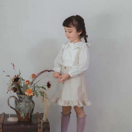 Frill suspender skirt / tweed milk