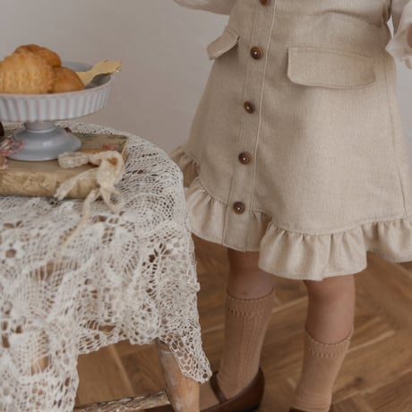 Frill suspender skirt / tweed milk