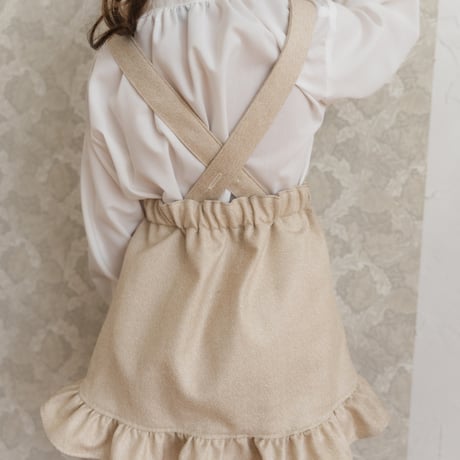 Frill suspender skirt / tweed milk