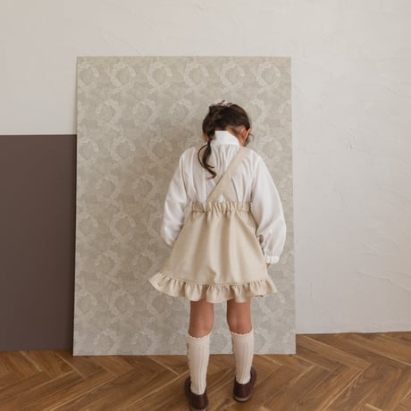 Frill suspender skirt / tweed milk