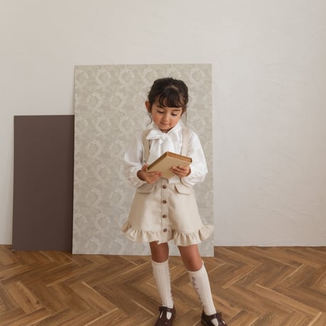 Frill suspender skirt / tweed milk
