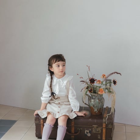 Frill suspender skirt / tweed milk