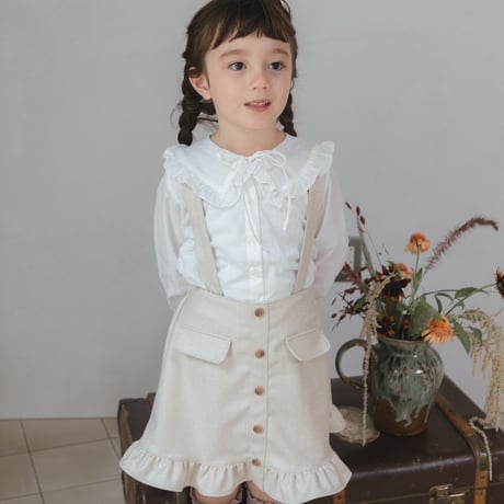 Frill suspender skirt / tweed milk