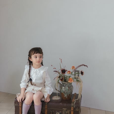 Frill suspender skirt / tweed milk