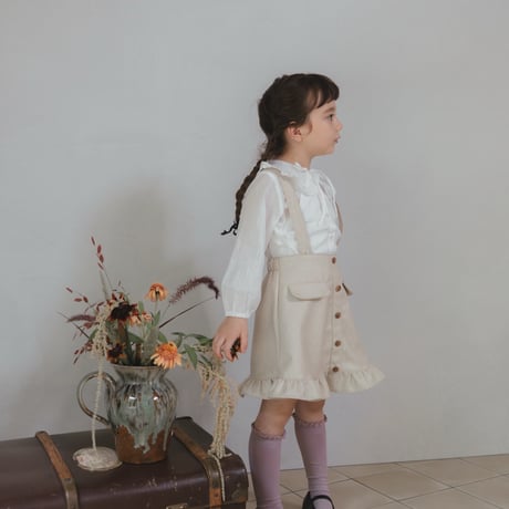 Frill suspender skirt / tweed milk