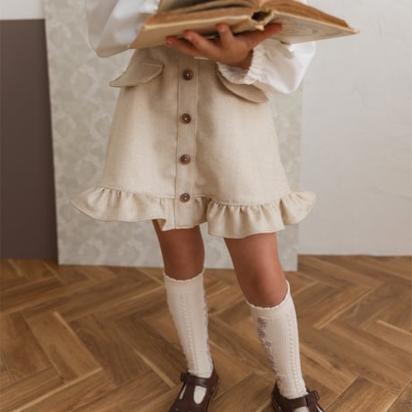 Frill suspender skirt / tweed milk