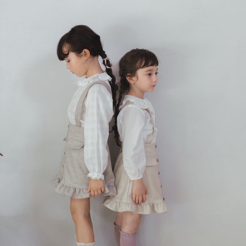 Frill suspender skirt / tweed grey | june -litt