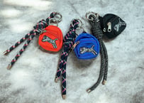 TORA backpack charm