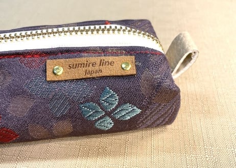 ペンケース型キャラメルポーチ／pencil case／パープル系　色とりどりの小花がステキな帯 1