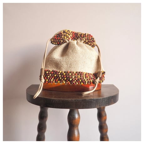 40〜50s wood beads× lucite drawstring woven bag (beige)