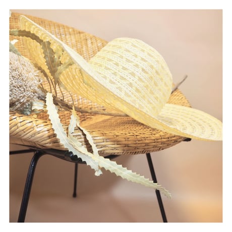 sheer pastel yellow wide brimmed hat