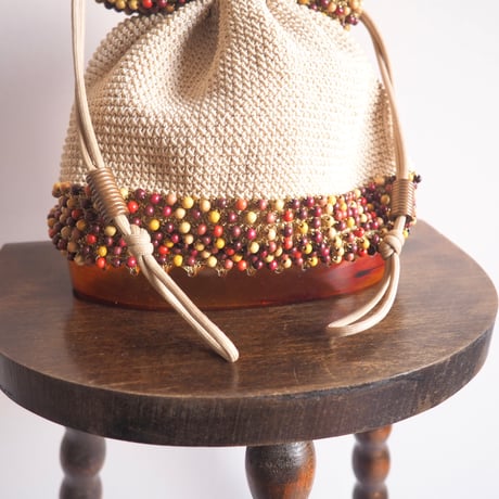 40〜50s wood beads× lucite drawstring woven bag (beige)