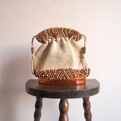 40〜50s wood beads× lucite drawstring woven bag (beige)