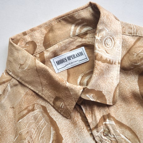 "MODUS OPERANDI" abstract print oversized s/s blouse