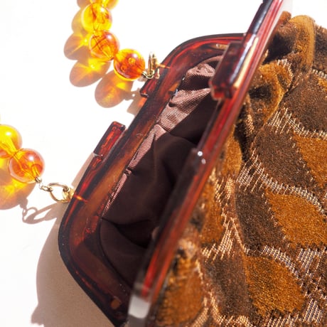 80s amber beads × velvet bag