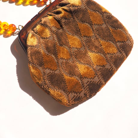 80s amber beads × velvet bag