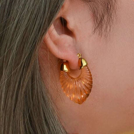Shell shaped pierce pale brown 316L