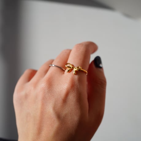 Bow tie ring gold 316L