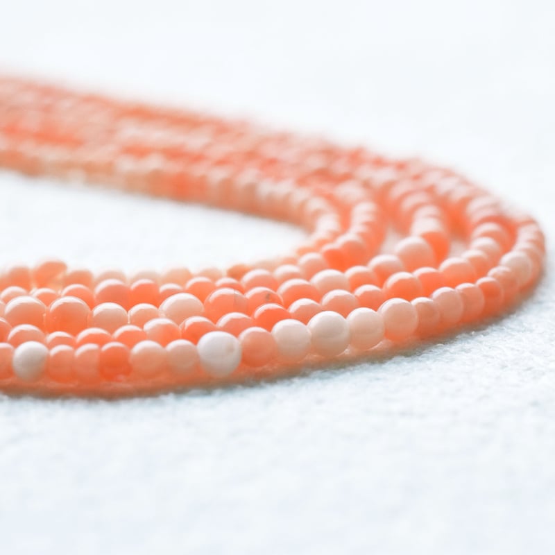 ナチュラルサンゴ 桃天然色 0.8～1.8mm 丸玉 | beads lot