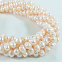 淡水パール オーバル 横穴 約7mm 【38cm】