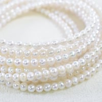 淡水パール ホワイト セミラウンド 約2.5×3.5mm 【40cm】