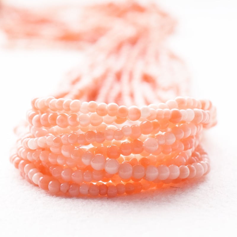 ナチュラルサンゴ 桃天然色 0.8～1.8mm 丸玉 | beads lot
