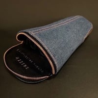 Black leather lined with denim