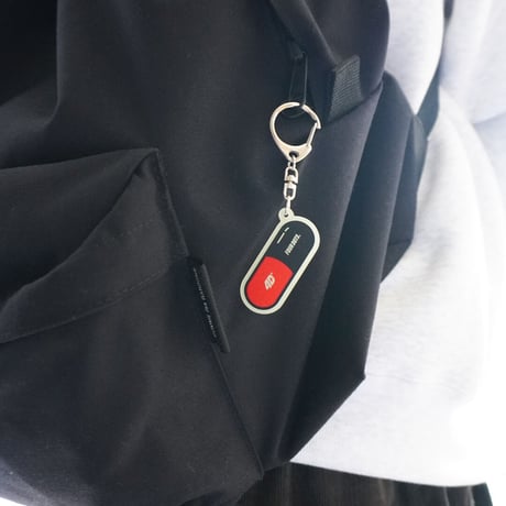 Capsule key chain MINI “KND”