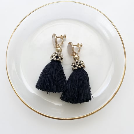 White perl × tassel