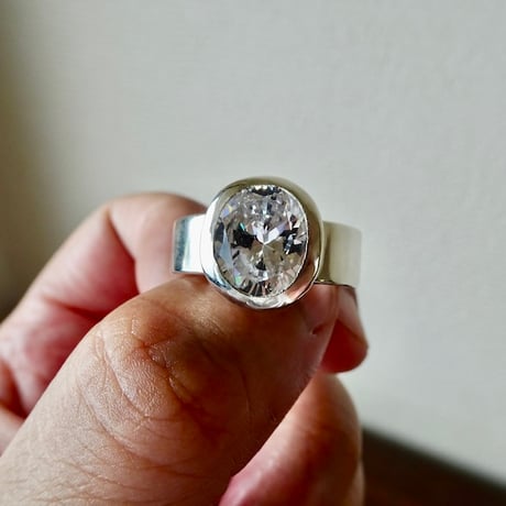仁尾彫金『オーバルカットジルコニア平打リング、幅７mm』ハンドメイド579