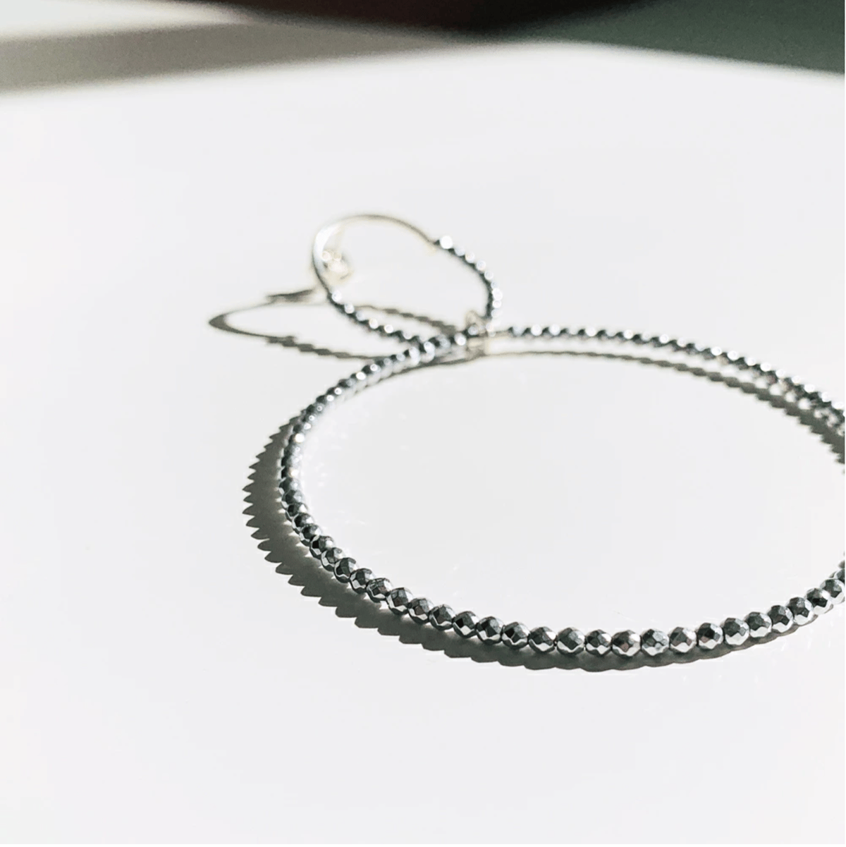 SASKIA DIEZ サスキア ディツ】【スパークリングイヤリング