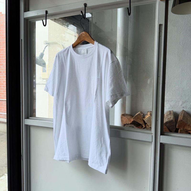 COMOLI サープラス Tシャツ | Less Higashikawa