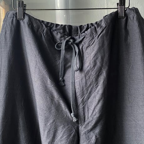 COMOLI   杢シルク テーパードパンツ
