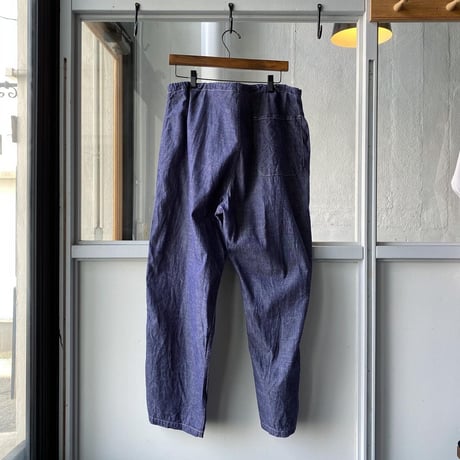 COMOLI ダンガリードローストリングパンツ
