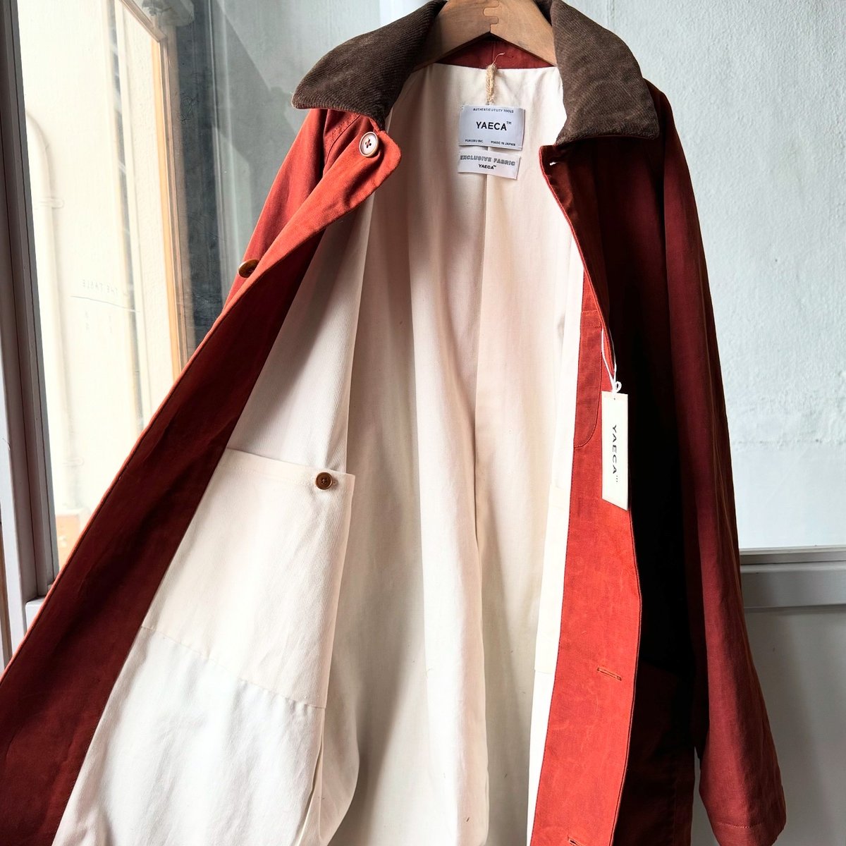 YAECA [WOMEN] CANVAS DESIGN Oiled Raglan Coat |