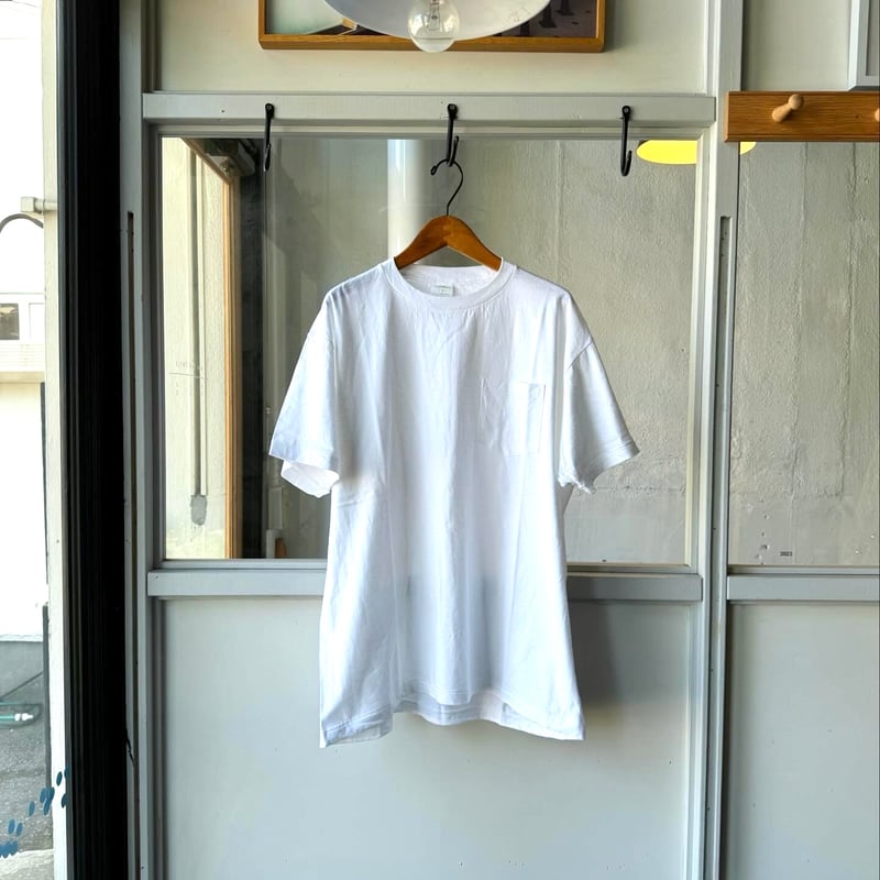 COMOLI サープラス Tシャツ | Less Higashikawa