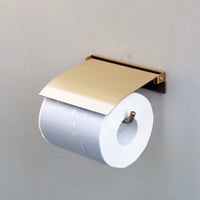真鍮のフラップ型トイレットペーパーホルダー