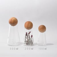 フラスコ(100㎖)と木球
